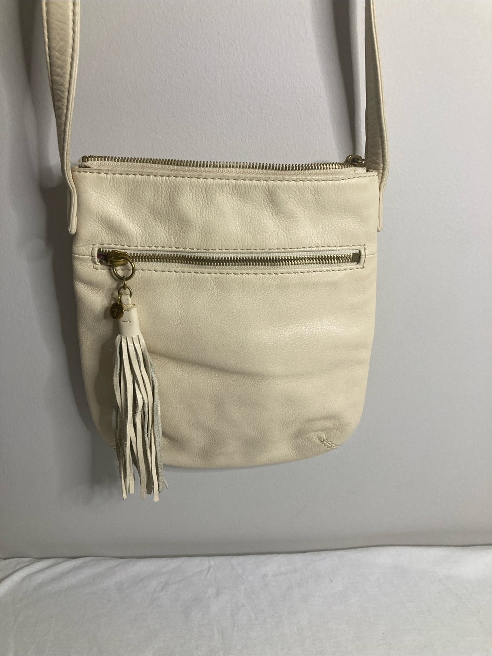 HOBO Off-White Leather Crossbody with Tassel Charm